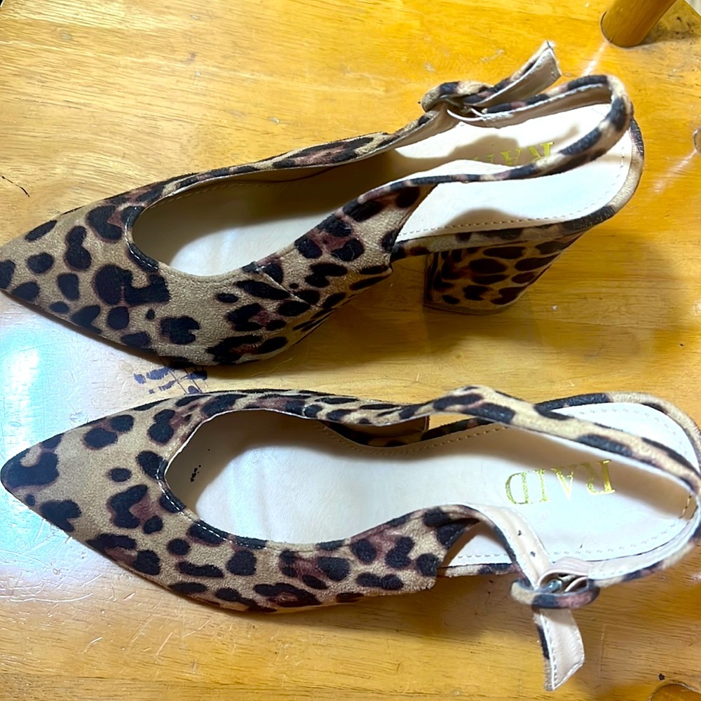 Tiger skin heeled pumps